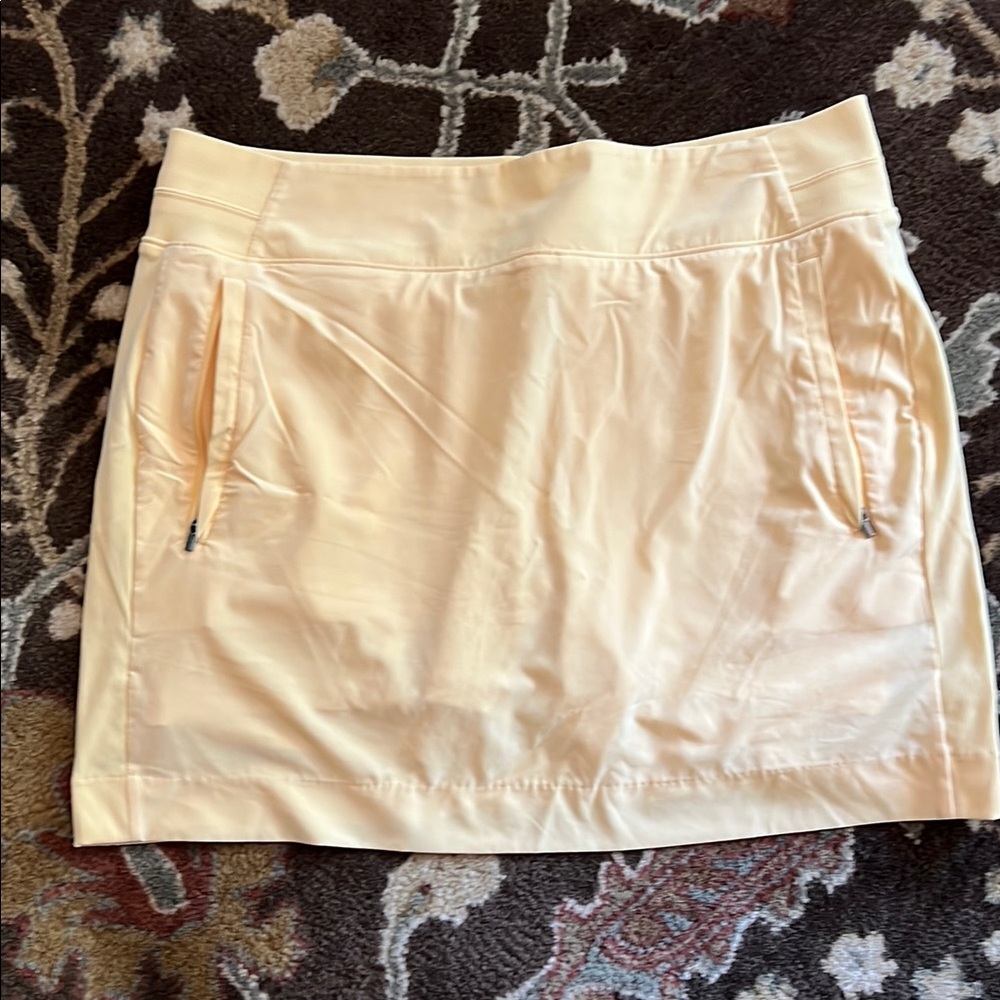 Athleta yellow skort with front zip and back pockets 10